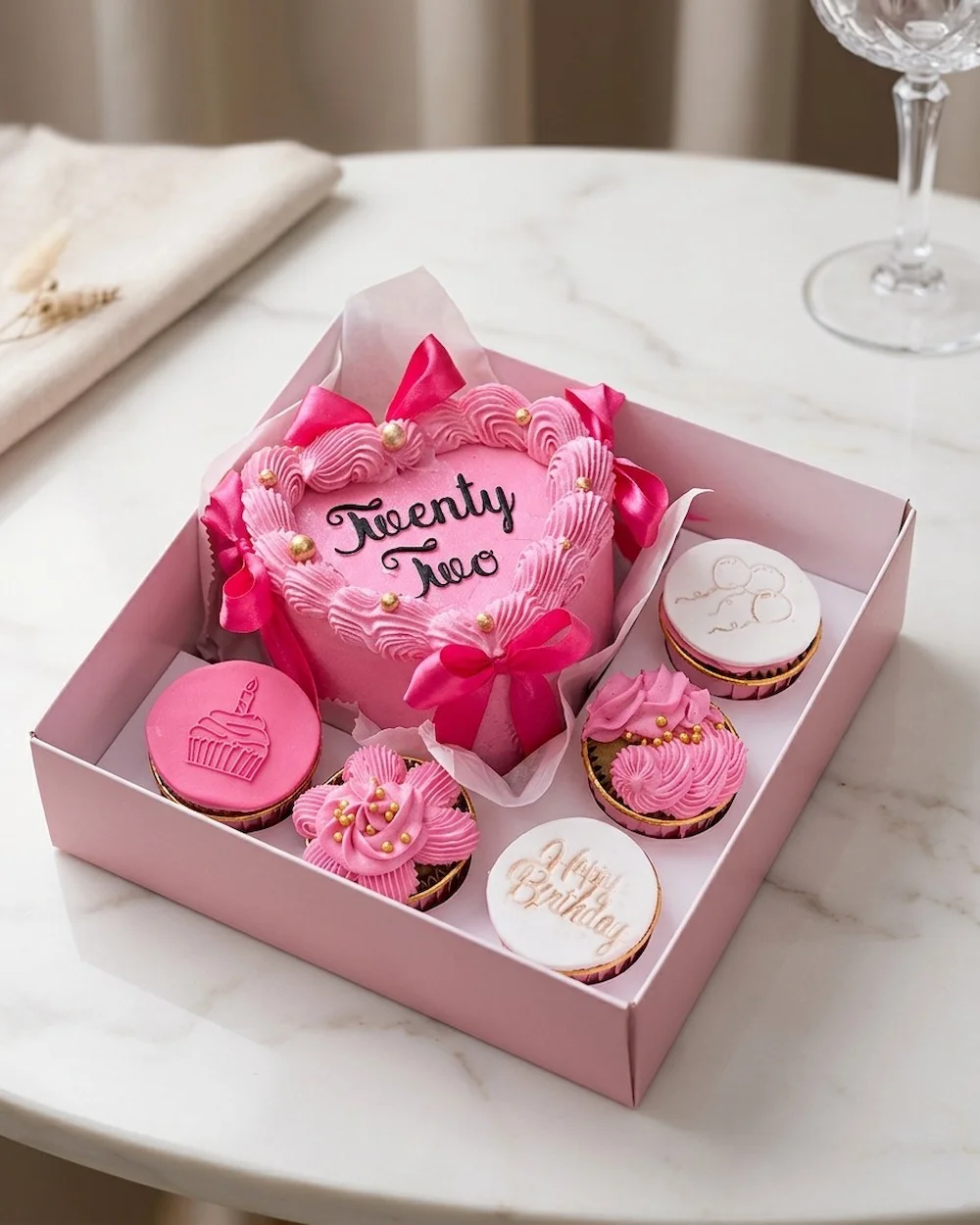 the milestone celebration cake and cupcake box